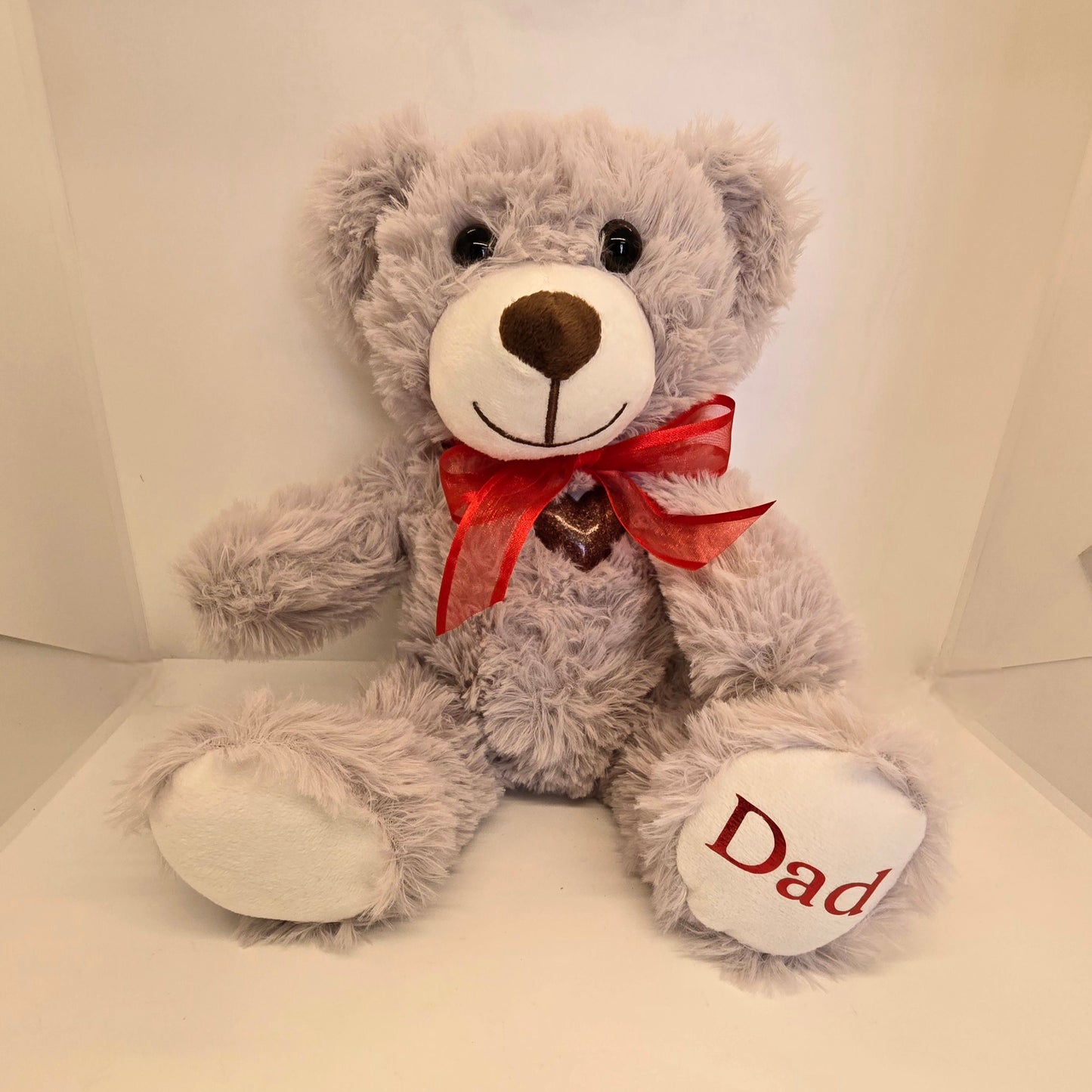 Scruffy cuddle bear display stand