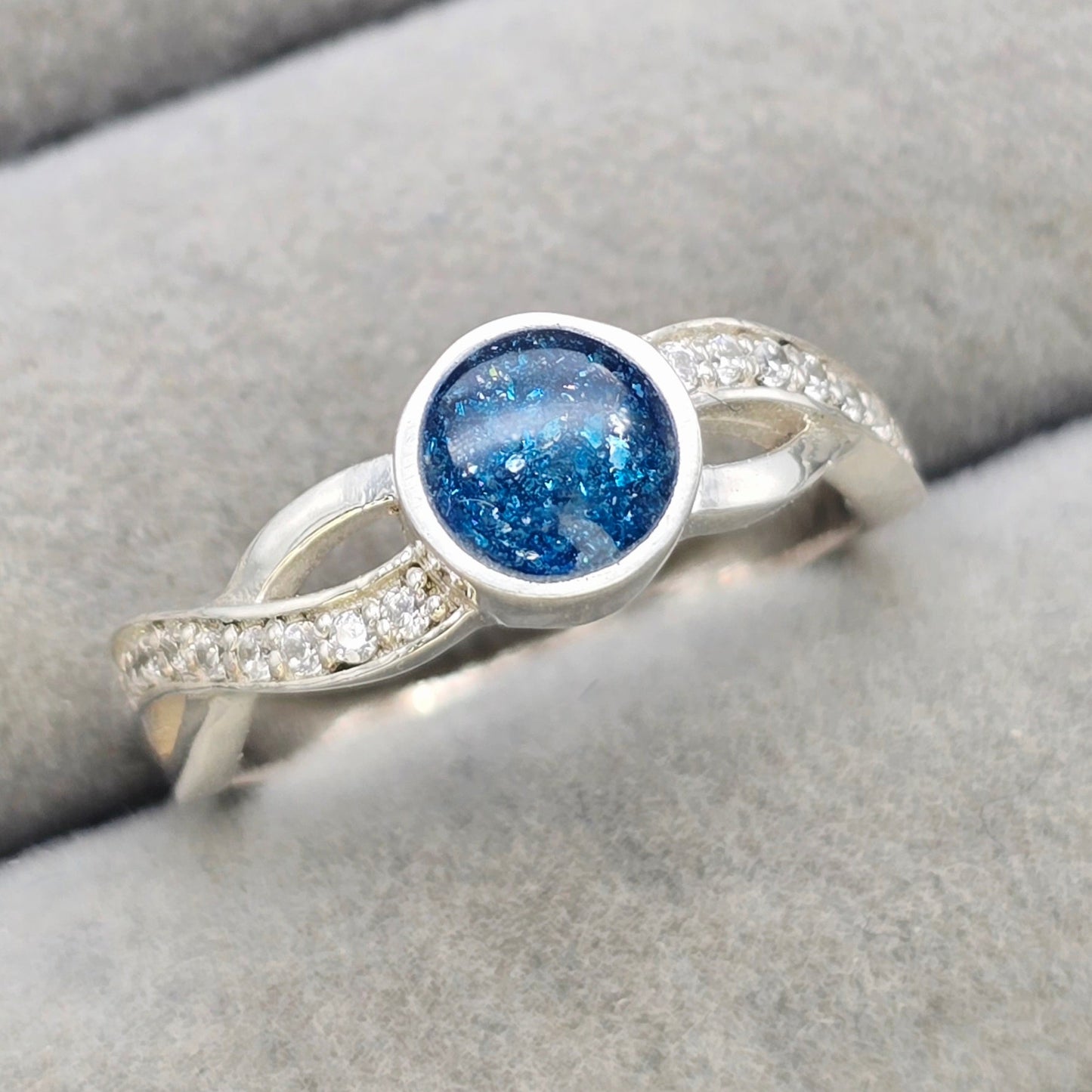 Katherine round criss-cross cz ring